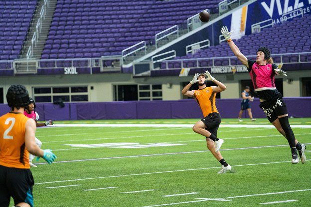 Camper catching pass